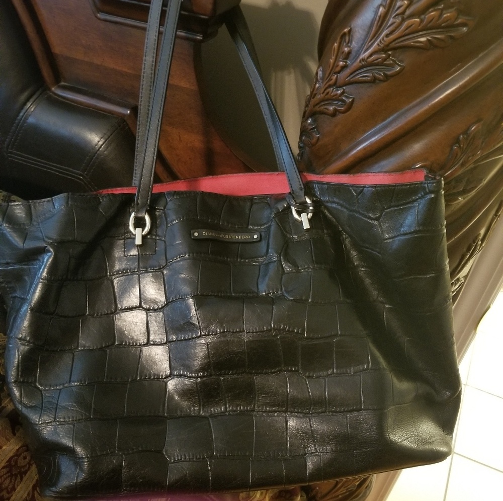 Diane Von Furstenberg Black leather purse $30